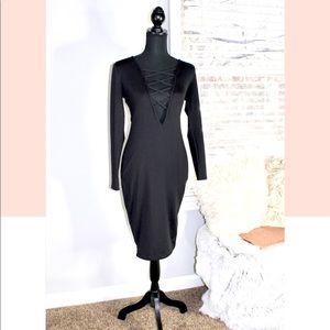 Plunging neckline black midi dress